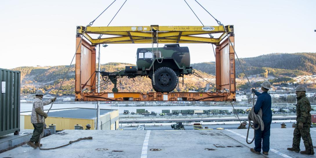 U.S. Marines assigned to 2nd Marine Aircraft Wing offload equipment from the aviation logistic ship S.S. Wright during Exercise Trident Juncture 18 at Orkanger Port, Norway. The exercise enhances the U.S. and NATO Allies’ and partners’ abilities to work together collectively to conduct military operations under challenging conditions. Credit: U.S. Marine Corps photo by Lance Cpl. Cody J. Ohira