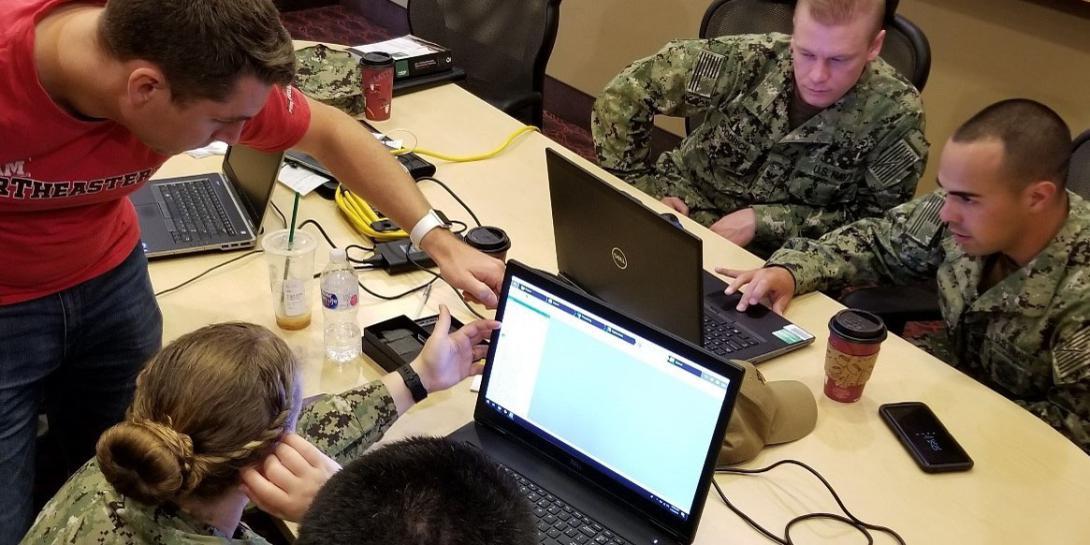 U.S. Navy sailors collaborate with Naval Information Warfare Center Pacific’s RESTORE Lab to explore how three-dimensional scanning and printing can deliver an effective and reliable solution to repair critical warfighting equipment. U.S. Navy photo by Cmdr. John P Fagan /Released