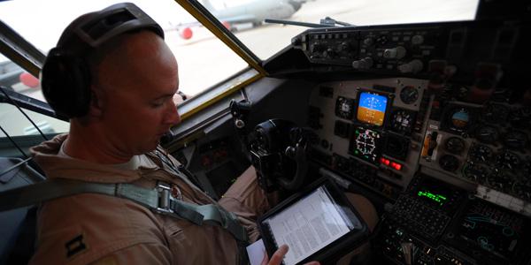 Complete electronic flight bags have been under development since 2010; however, U.S. Air Force personnel like Capt. Brett Pierson, USAF, have been using tablets as early as 2011 during preflight checks aboard a KC-135 Stratotanker aircraft bound for refueling missions in Afghanistan.