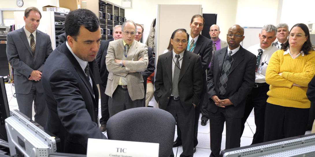 U.S. Navy personnel learn about the Office of Naval Research's suite of information technology tools designed to improve fleet operations.
