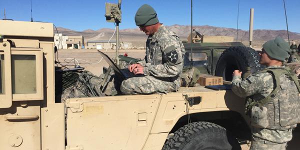 U.S. soldiers conduct cyberspace operations during a training rotation last January at the National Training Center at Fort Irwin, California. They are among several cyber organizations taking part in pilot programs to help the Army develop how it will build and employ cyber in its tactical formations.