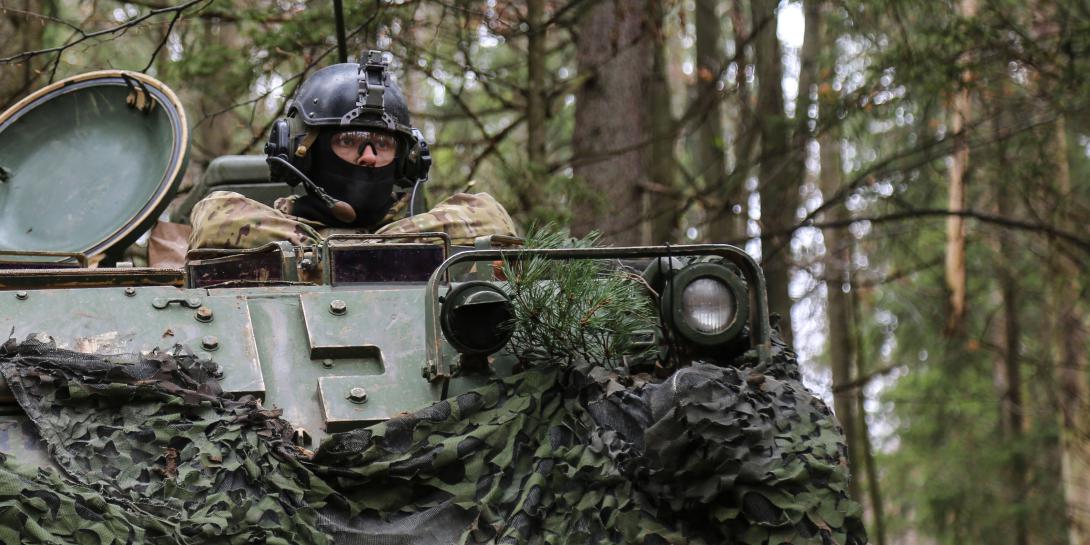 A soldier with the 1st Infantry Division provides security during exercise Allied Spirit VII in Hohenfels, Germany. In the future, the trees surrounding the soldier may be used as networked sensors if work underway at the Army Research Laboratory (ARL) bears fruit.