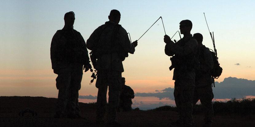 A group of U.S. Army soldiers sets up manpack radios during a recent Network Integration Evaluation exercise. The Army is on the cusp of dramatic change as it revisits its technological needs for networking in a new battlefield environment. Lt. Gen. Bruce T. Crawford, USA, is the Army chief information officer (CIO) and G-6.