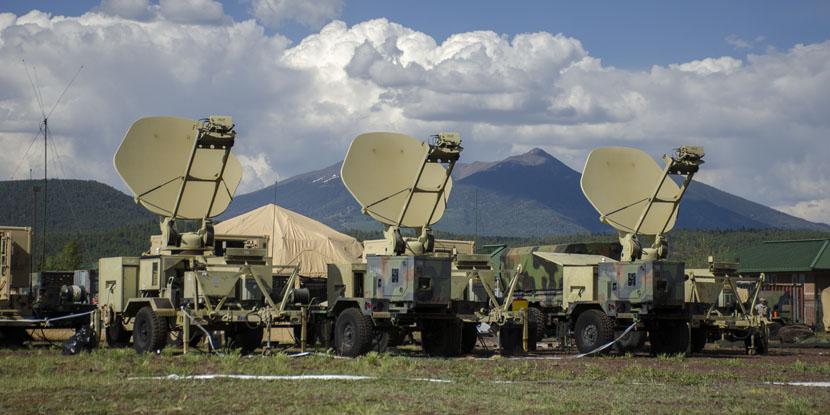 Army satellite transportable terminals establish links with orbiters to provide communications support to ground forces. The Army faces a pressing need for better antijam satellite communications amid an increasingly hostile electromagnetic environment.