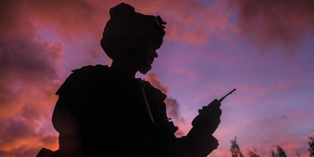 A U.S. Marine uses a radio during a field exercise on the Japanese island of Okinawa. New mobile technologies emerging from industry will be essential for the U.S. military to maintain battlespace supremacy, and the Defense Information Systems Agency (DISA) is striving to incorporate them into the force.
