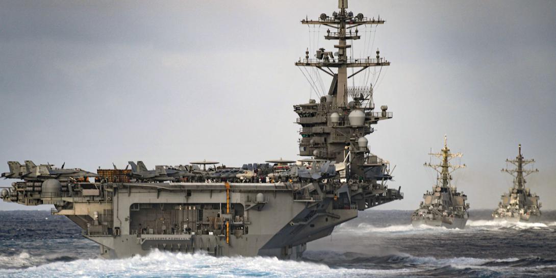 The aircraft carrier USS Theodore Roosevelt transits the Pacific Ocean with the USS Russell and the USS Paul Hamilton. The U.S. Navy is facing several challenges as it strives to modernize its information technology across the breadth of its sea and land assets.  U.S. Navy photo