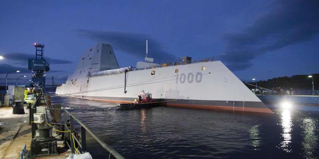 The U.S. Navy’s newest destroyer, the USS Zumwalt, departs its dry dock at Bath Iron Works, Maine, prior to conducting at-sea trials in the Atlantic Ocean. The technology-rich Zumwalt may serve as a template not only for future Navy ships but also for a highly skilled crew capable of handling multiple tasks.