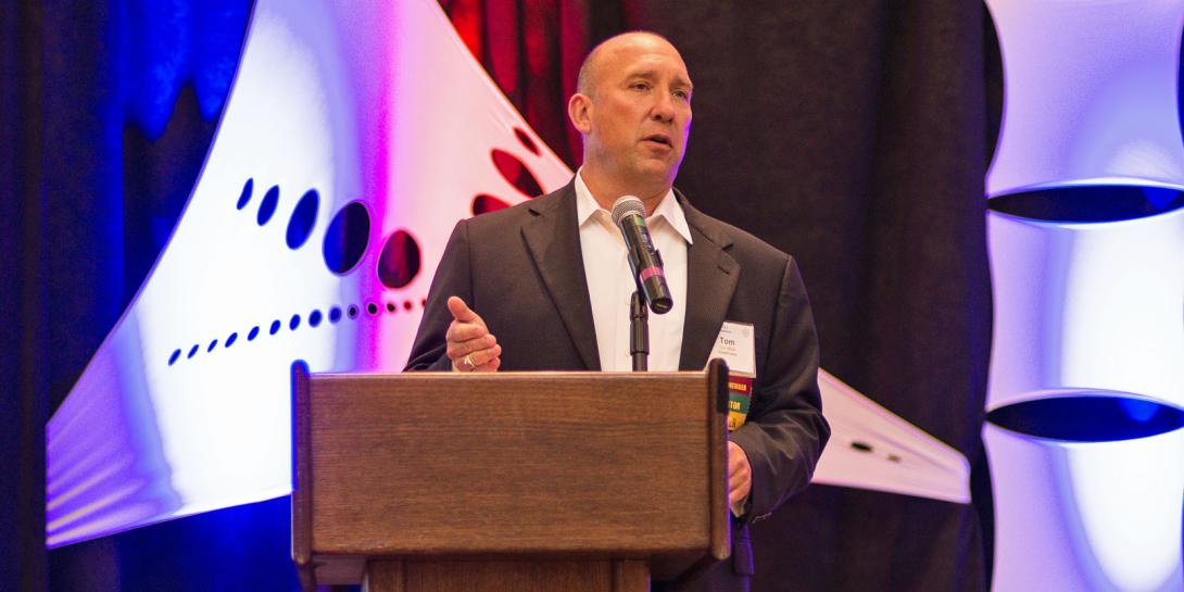 Tom Miller, CEO of Clearforce, gives the winning presentation at the shark tank concluded at AFCEA’s Small Business Innovation Summit held July 26. Photography: Elizabeth Moon