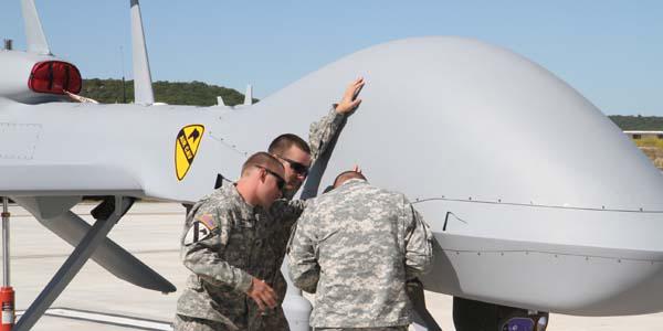 U.S. Army troopers with the 227th Aviation Regiment, 1st Air Cavalry Brigade, 1st Cavalry Division, prepare the networking system of an MQ-1C Gray Eagle unmanned aircraft during a logistical demonstration at West Fort Hood, Texas, in 2014. Capable of flying higher than 20,000 feet, the Gray Eagle provides real-time surveillance, reconnaissance and attack capabilities.