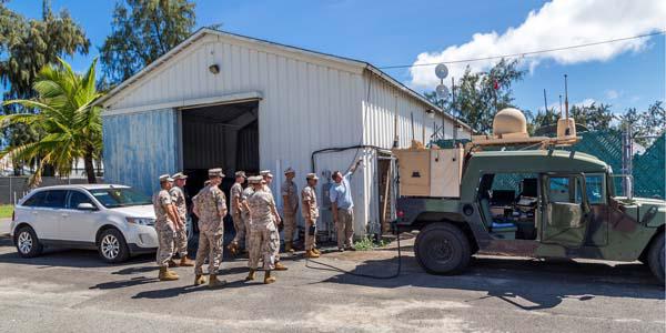 U.S. Marines learn about network and communication technology available at the 2014 Agile Bloodhound demonstration in Hawaii.