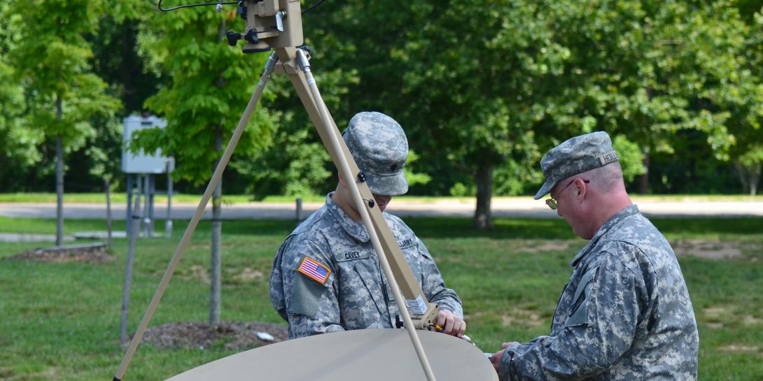 Soldiers with the 4th Battalion, 3rd U.S. Infantry Regiment (The Old Guard) and the Alabama Army National Guard assemble a VSAT, similar to the one Army Medical Command personnel rely upon for telemedicine support when forward-deployed. 