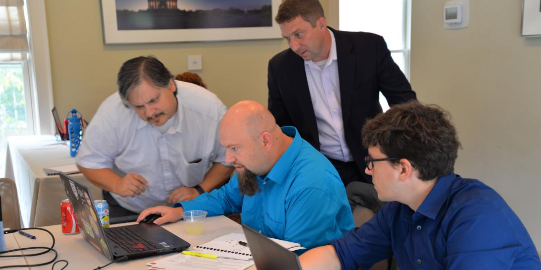 ManTech  conducts a cyber testing and training exercise with cyber experts from the financial sector.