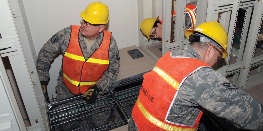 Select personnel from 15 Air National Guard Engineering and Installation organizations are installing more than 600 miles of cabling in support of the U.S. Strategic Command (STRATCOM), Command and Control facility (C2F) construction project. U.S. Air Force photo by Steve Cunningham