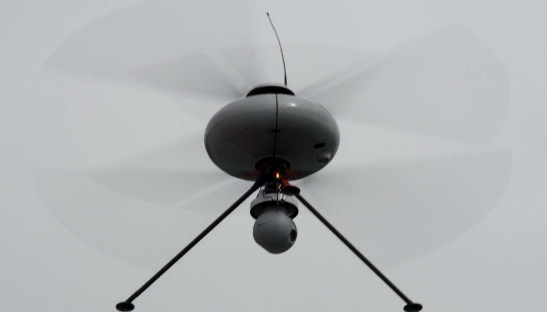 A French unmanned aerial vehicle hovers in front of a crowd during a demonstration at the Brunei Darussalam International Defense Exhibition in Bandar Seri Begawan in 2013. The exercise focuses on multilateral relationships and enhances preparedness for disasters and other operations.
