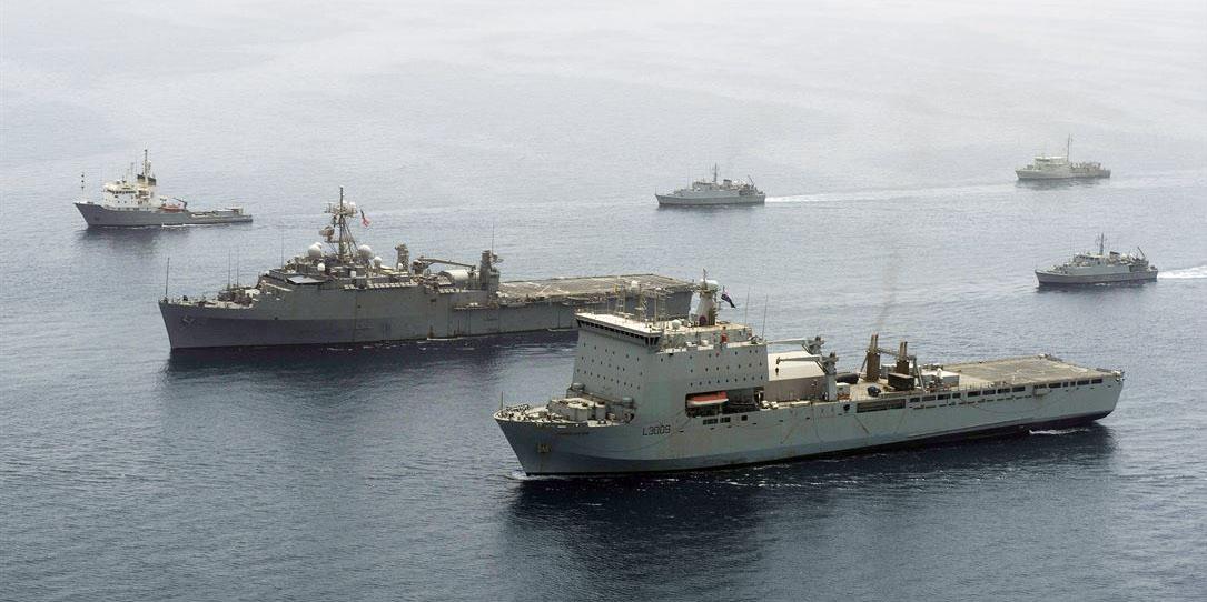 The USS Ponce (second ship in the foreground) once carried the first laser weapon demonstrator. Now the Navy will begin fielding a laser weapon and optic dazzler for for its Naval Sea Systems Command aboard a DDG  51 FLT IIA by 2020.