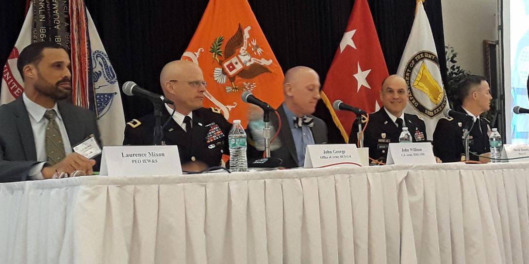 Panelists discuss military technology acquisition at the AFCEA Army Signal Conference.