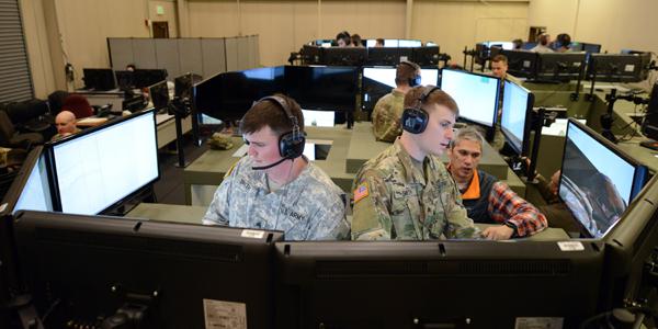 Soldiers train in a Stryker Virtual Collective Trainer at the Mission Training Complex on Joint Base Lewis-McChord, Washington. The system was recently fielded to Vilseck, Germany, the first fielding in Europe.   Credit: C. Todd Lopez