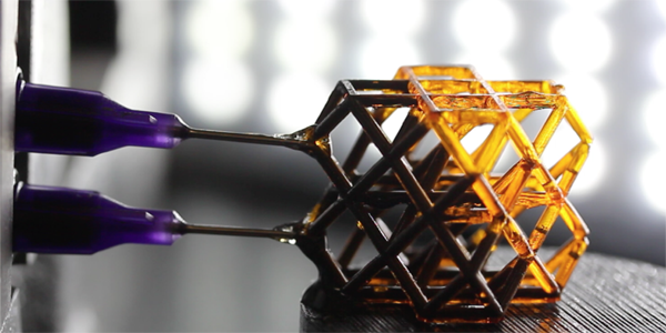 Researchers injected a magnetorheological (MR) fluid into hollow lattice structures built on LLNL’s Large Area Projection Microstereolithography (LAPµSL) platform, which 3D prints objects with microscale features over wide areas using light and a photosensitive polymer resin. Photo by Julie Mancini/LLNL