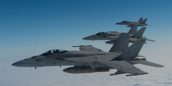 Three U.S. Navy F/A-18E Super Hornets from Marine Corps Air Station Iwakuni, Japan, fly in formation during Exercise WestPac Rumrunner January 10. (Photo by U.S. Air Force Senior Airman Senior Airman Cynthia Belío)