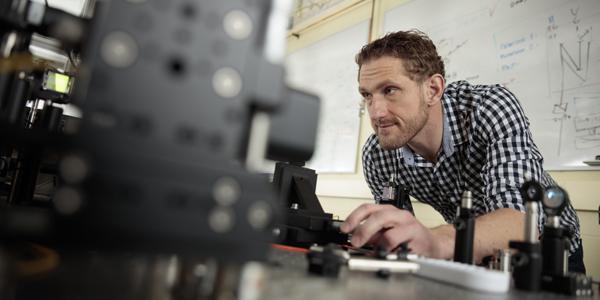 Michael Reimer, assistant professor of electrical and computer engineering at the University of Waterloo, aligns a quantum light source at the university’s Institute for Quantum Computing. Work performed at the institute could lead to quantum radar capable of seeing through high-energy interference as well as detecting stealth aircraft.