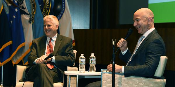Lewis Shepherd (l), executive consultant on advanced technologies at Deloitte, spoke with Jeff Bezos, founder of Amazon and Blue Origin, about the rapid changes in technology at the AFCEA 2017 Spring Intelligence Symposium.