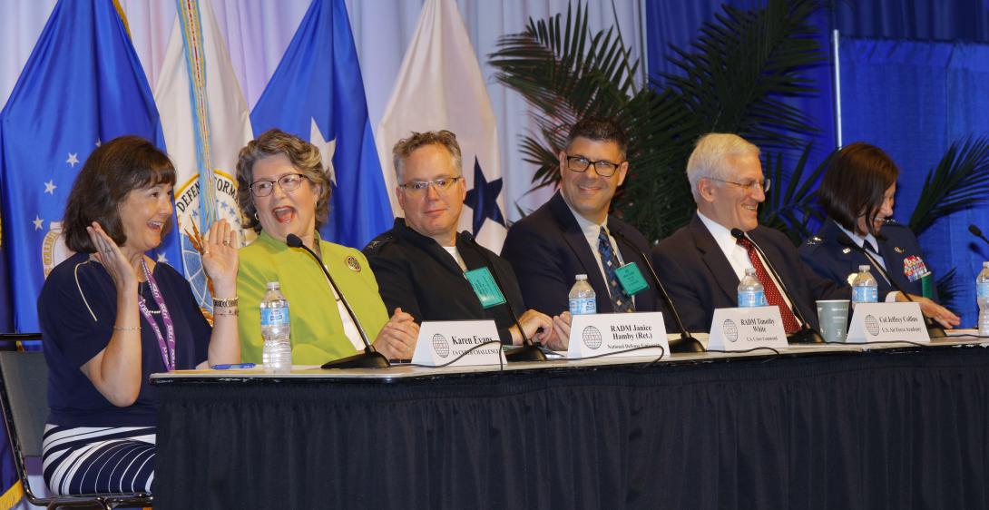 A panel discusses the cyber work force during AFCEA's Defensive Cyber Operations Symposium.