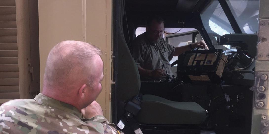 A U.S. Army logistics management specialist instructs a soldier in the installation of the Joint Capabilities Release—Logistics System in an Army vehicle. The Defense Information Systems Agency increasingly is looking to small business for innovative communications and electronics technologies that can be acquired and deployed rapidly.