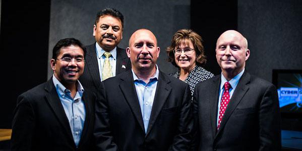 Tom Miller (c), CEO of ClearForce, stands with the judges who declared his firm’s technology the winner in the second AFCEA Small Business Innovation Showcase Competition. Flanking Tom are (l-r) Glenn Hernandez, CISO, OpEdge Solutions LLC; Manoj Bhatia, president, Network Runners Inc.; Maria Horton, CEO of EmeSec; and Bill Jones, senior vice president of DSA’s Integrated Solutions Group. Photo credit: Elizabeth Moon