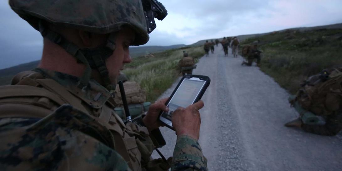 A U.S. Marine uses a tablet to communicate in real-time during the Infantry Officer’s Course.
