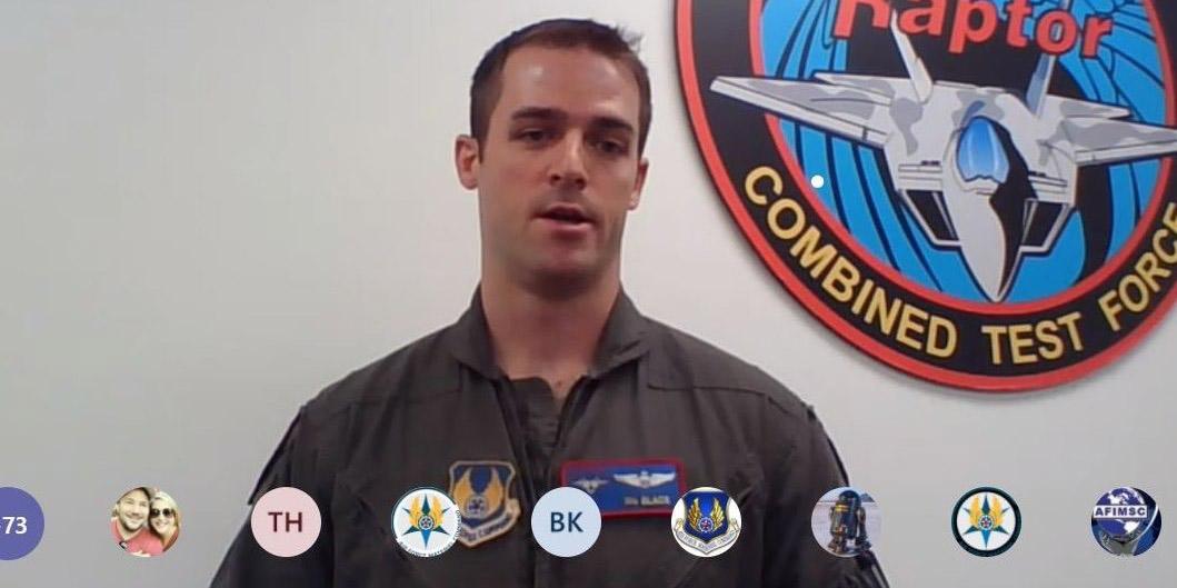 Pilot Maj. Allen Black, USAF, Air Force Test Center, one of two semifinalists of the U.S. Air Force’s Material Command (AFMC) Spark Tank competition, speaks to leaders about his solution to enable interoperability between the recently upgraded F-22 open architecture rack and the F-35’s so-called FoX Table effort. Credit: AFMC