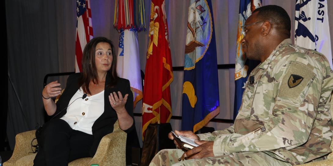 Jennifer Swanson, director, Software Engineering Center, Army Communications-Electronics Command (CECOM) and CW5 Linc McCoy, USA, CECOM’s command chief warrant officer, have a fireside chat during TechNet Augusta 2021.