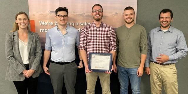 TRSS colleagues formed Team PhishRSS to enter this year’s AFCEA EPIC App Challenge, creating an app that adds an element of security to social media privacy settings to win the $5,000 first place prize. Pictured from left: Hannah Lensing, Zach Seid, Zachary Drake, Chris Smith and William Garcia.