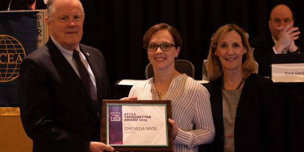 Accepting the Trendsetter Award on behalf of Chenega MIOS is Heather Lacroix (c), a member of AFCEA’s Small Business Committee and president of Chenega Technical Innovations. The award was presented by Lt. Gen. Robert Shea, USMC (Ret.), president and CEO of AFCEA, and Tina Jordan, AFCEA’s vice president of membership, at the Homeland Security Conference. Credit: Carizza Rosales