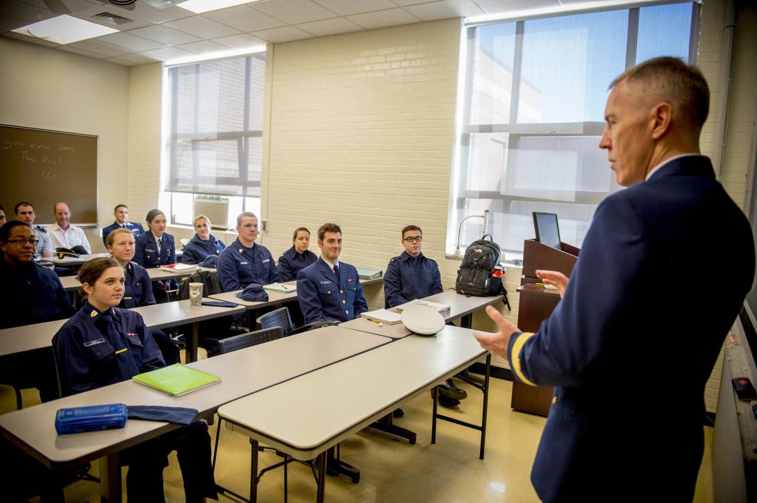 Rear Adm. Kevin Lunday, USGC, commander of Coast Guard Cyber Command and assistant commandant for Command, Control, Communications, Computers and Information Technology (C4IT), speaks to Coast Guard Academy electrical engineering cadets about CG Cyber.