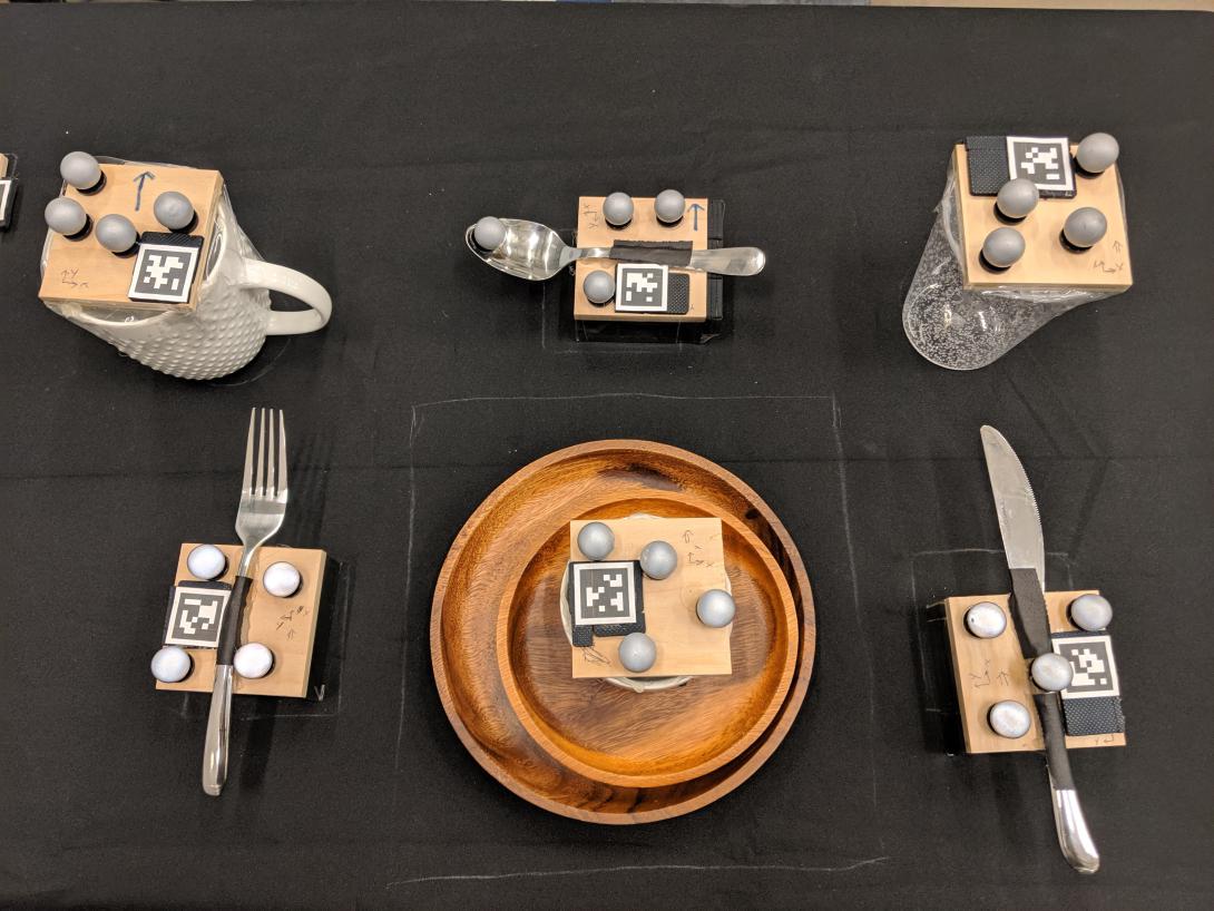 A PUnS-powered robot arm made very few mistakes after observing a human set a dinner table.  MIT Interactive Robotics Group