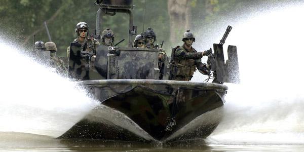 Special warfare combatant-craft crewmen transit the Salt River in northern Kentucky on the Special Operations Craft-Riverine during pre-deployment, live-fire training. FLIR Surveillance Inc. was awarded a contract for Combatant Craft Forward Looking Infrared variant 2.