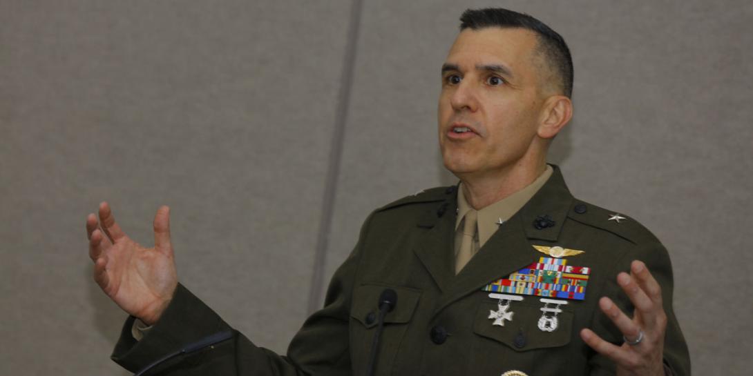 Brig. Gen. Dennis Crall, USMC, deputy principal cyber advisor, Office of the Secretary of Defense, speaks at the National Security Technology Forum and Exposition in San Diego. Photo by Michael Carpenter