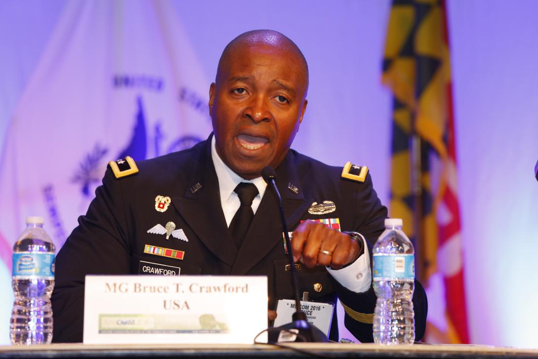 Maj. Gen.  Bruce Crawford, USA, commanding general of U.S. Army Communications-Electronics Command (CECOM), speaks on a panel during MILCOM 2016. Photo by Mike Carpenter