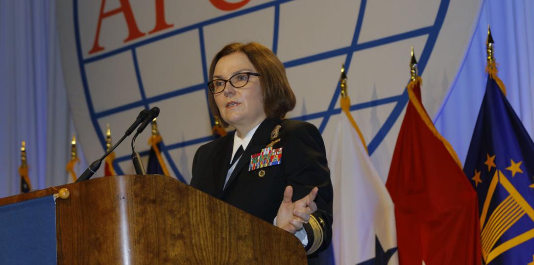 Rear Adm. Kathleen Creighton, USN, deputy commander, JFHQ-DODIN, moderates a panel at DCOS.
