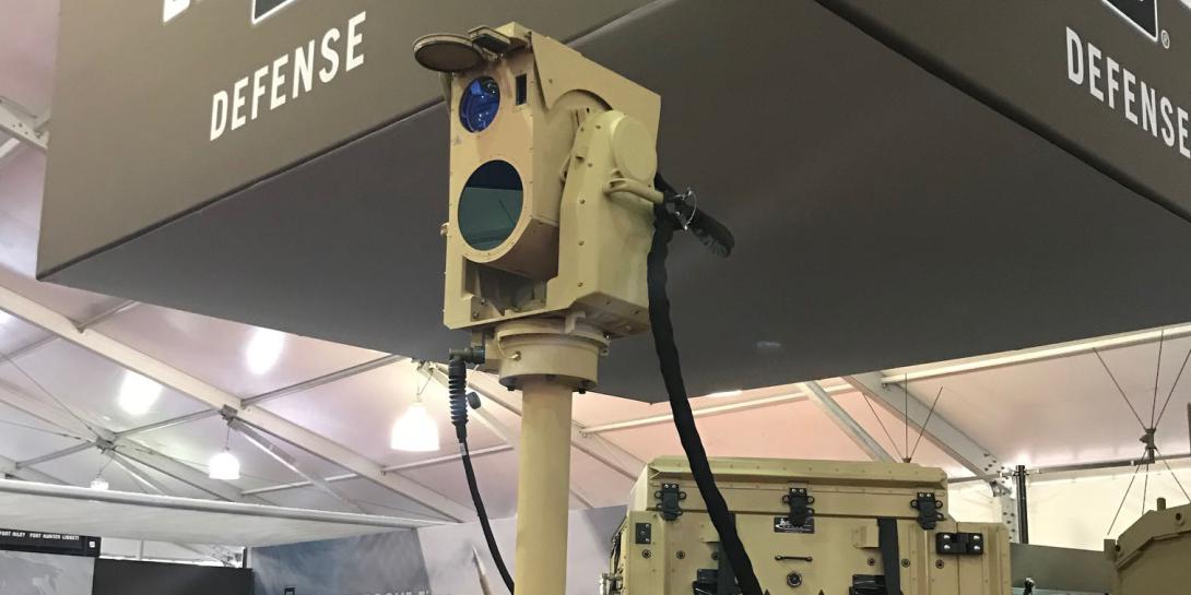 Appearing at the Modern Day Marine industry-related exhibits, Boeing’s compact laser weapon system is shown mounted on OshKosh Defense’s joint light tactical vehicle (JLTV). Credit: Kimberly Underwood