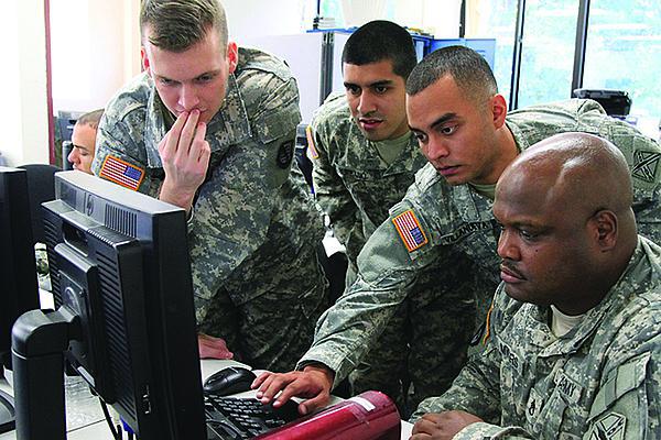 Virginia National Guard soldiers from the Fairfax-based Data Processing Unit respond to a simulated cyber attack during a cyberdefense exercise.