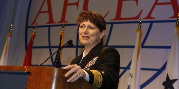 Vice Adm. Jan E. Tighe, USN, commander, Fleet Cyber Command and 10th Fleet, reviews cyberthreats during the AFCEA 2016 AFCEA Defensive Cyber Operations Symposium.