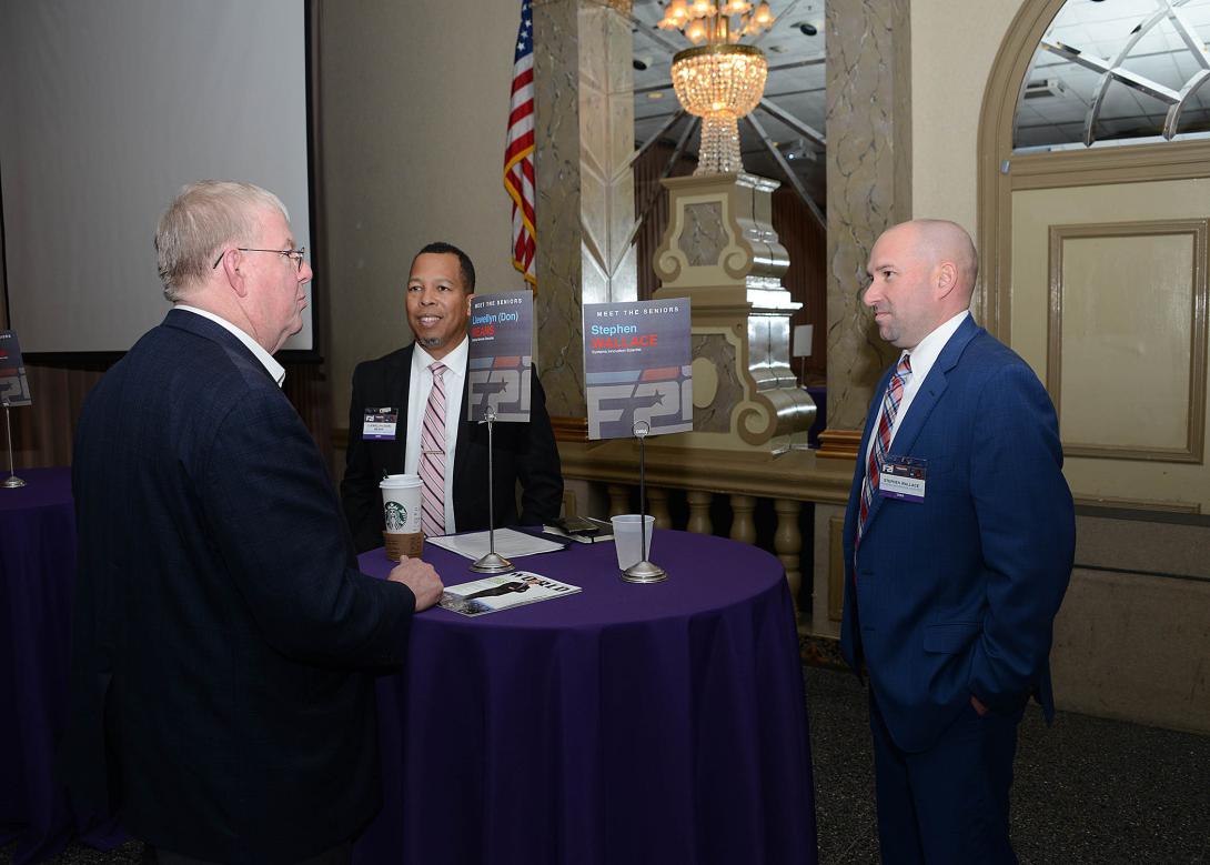 Llewellyn Means (c) and Stephen Wallace (r) speak with an industry official during DISA's 2019 Forecast to Industry. The agency is planning to virtually present this year's Forecast the week before the virtual TechNetCyber Cyber conference December 1-3. Credit: DISA