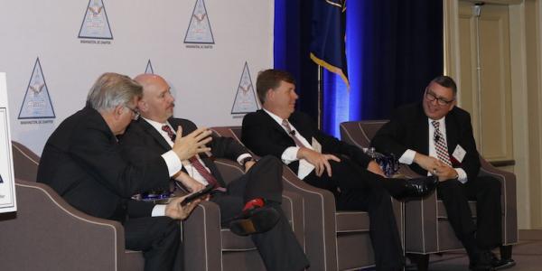 DISA officials present agency needs to industry during an AFCEA DC Chapter breakfast that included (l-r) Tony Montemarano, David Mihelcic, John Hickey and Alfred Rivera. Photo by Mike Carpenter. 