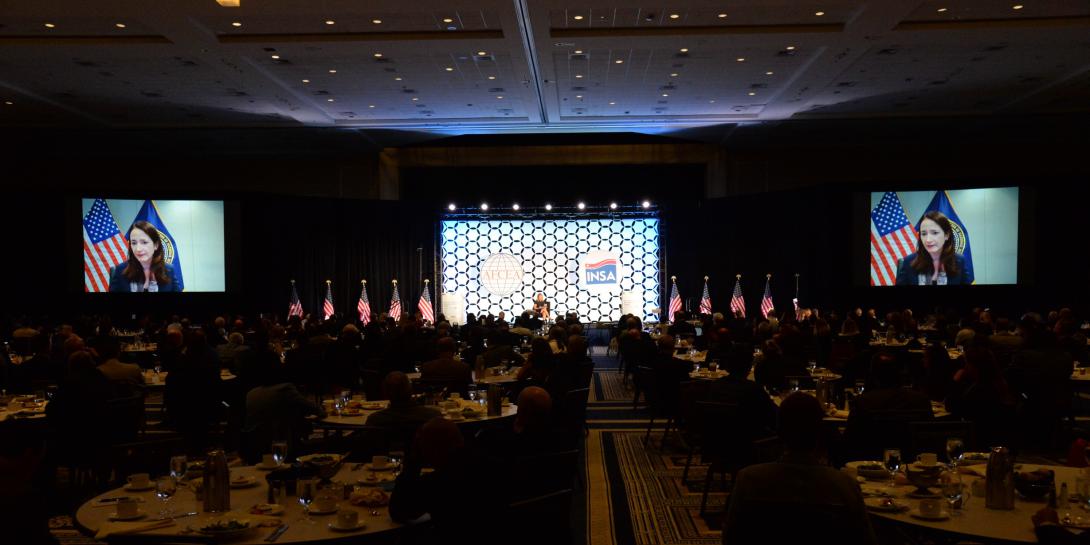 Director of National Intelligence Avril Haines speaks by video to the live audience at the opening luncheon of the 2021 Intelligence and National Security Summit. Photo by Herman Farrer