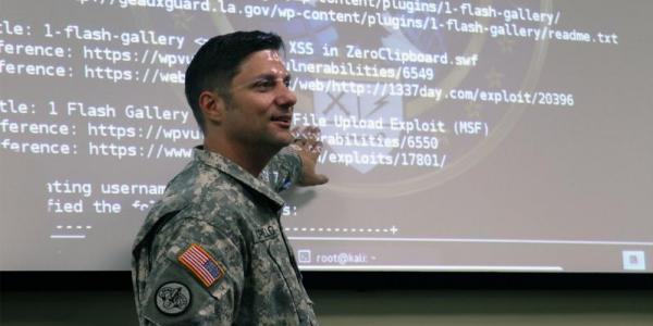 A Louisiana Army National Guard chief communications plans officer trains members of the Cyber Defense Incident Response Team to defend the state’s cyber assets in November 2015. Photo courtesy DOD