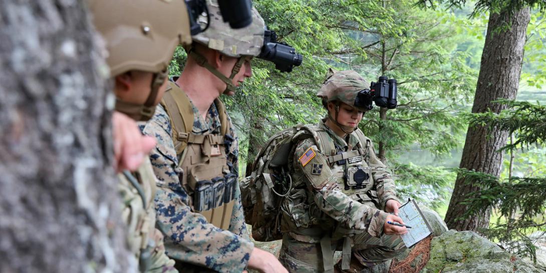 Sgt. Gabrielle Hurd, 237th Military Police Company, New Hampshire Army National Guard, shows her team the route they will take before embarking on an overnight hike to the summit of Mount Monadnock, New Hampshire, during an Enhanced Night Vision Goggle-Binocular Soldier Touchpoint in July. PEO-Soldier incorporates soldier feedback into the ENVG-B product and many others which helps the Army integrate the current needs of soldiers with the Army’s future, multidomain battlefield. Photo by Patrick Ferraris