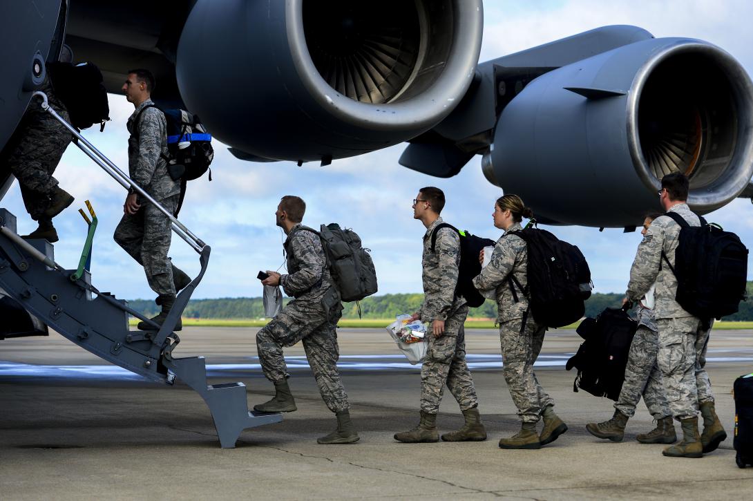 U.S. Air Force troops from the 633rd Medical Group load onto a C-17 Globemaster at Langley Air Force Base, Virginia, on September 26. They packaged and delivered a modular medical treatment center as part of a U.S. government-wide effort to support humanitarian relief operations in Ebola-stricken West African nations.
