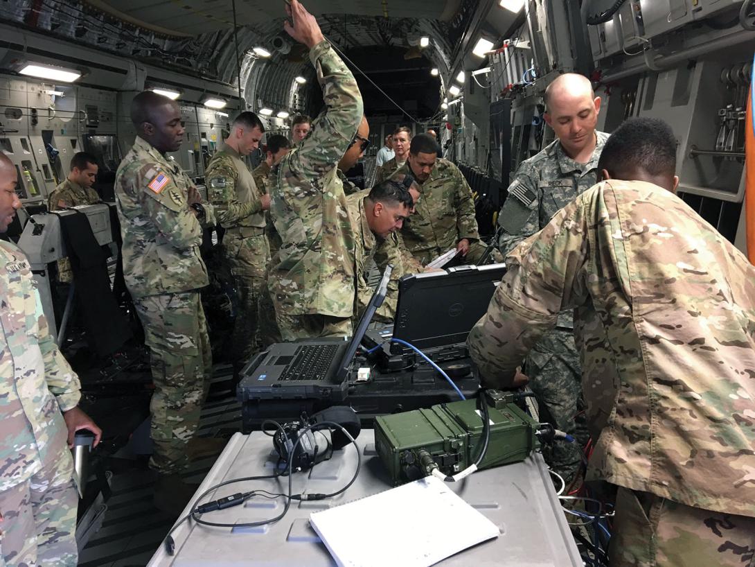 Project Manager Tactical Network developed the Enroute Mission Command system to enable real-time joint intelligence, communications and collaboration capabilities on a flight from Fort Bragg, North Carolina, to New Mexico. U.S. Army photo by 2nd Lt. Zachary Jacobson, 50th Expeditionary Signal Battalion, 35th Signal Brigade