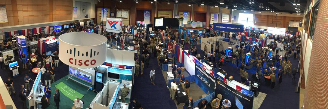 Attendees of AFCEA’s TechNet Augusta 2016 network on the exhibit floor. The symposium enables participants to understand the challenges the cyber element introduces into a combat arms fight.